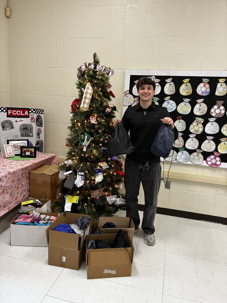 Student donates care bags outdoors