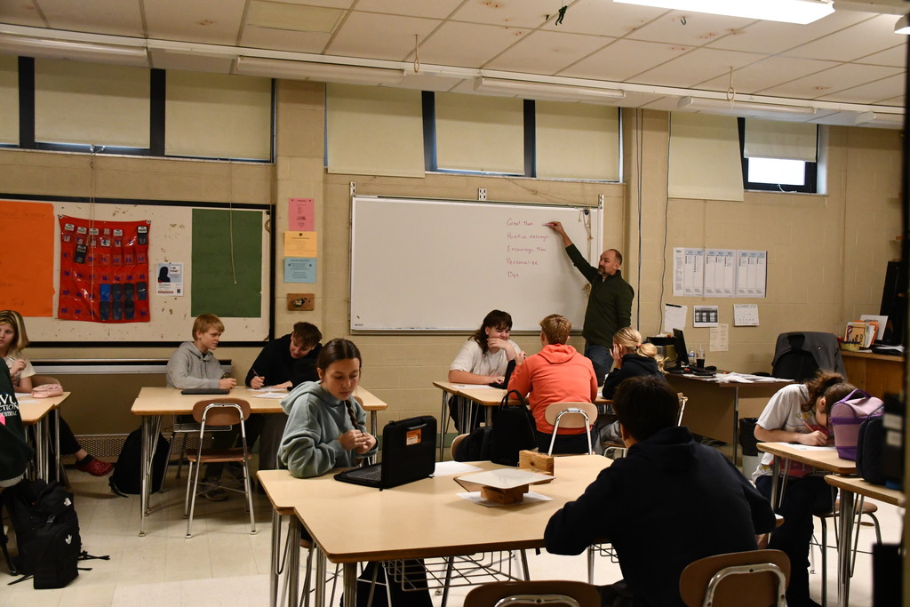 High school students write affirmation postcards