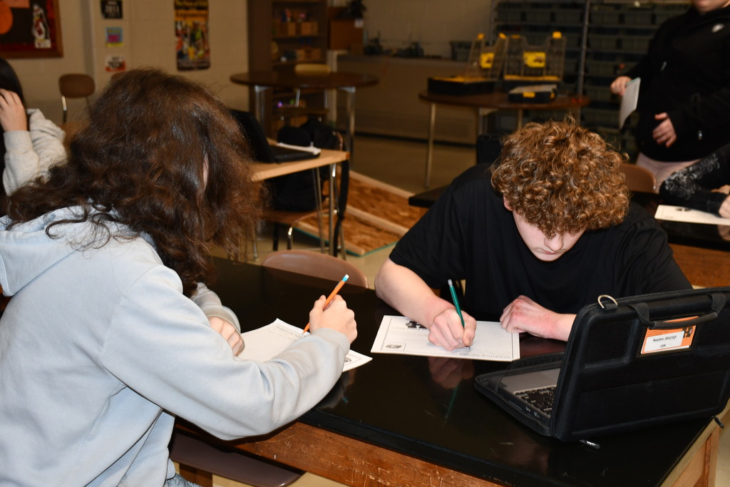 High school students write affirmation postcards