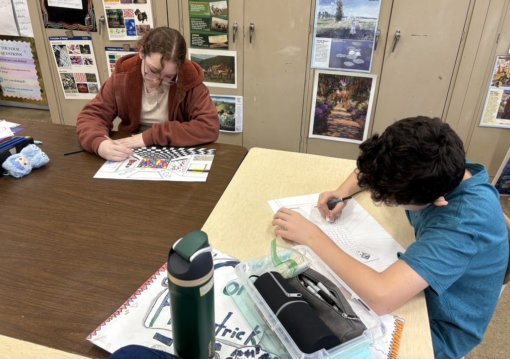Seventh graders drawing one-point perspective galleries
