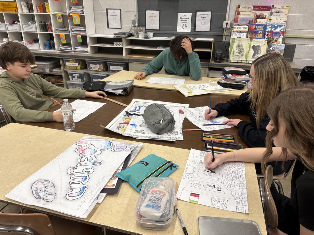 Seventh graders drawing one-point perspective galleries