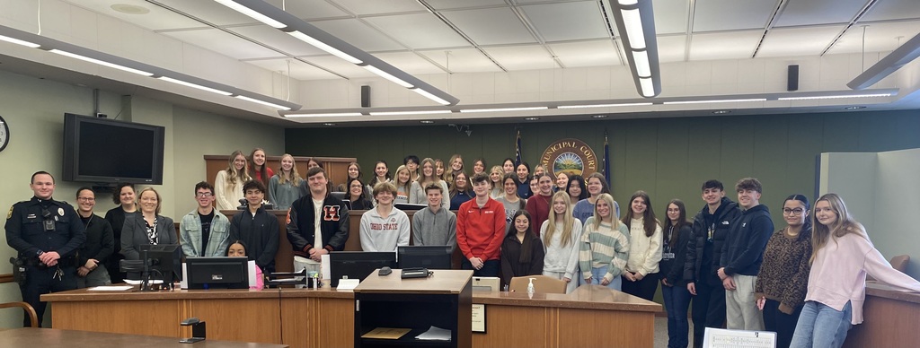 Judge speaking to students