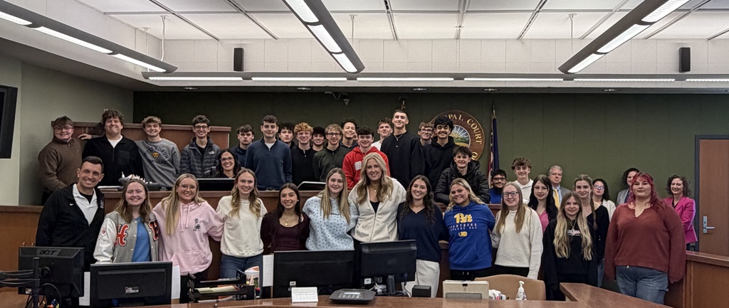 Judge speaking to students