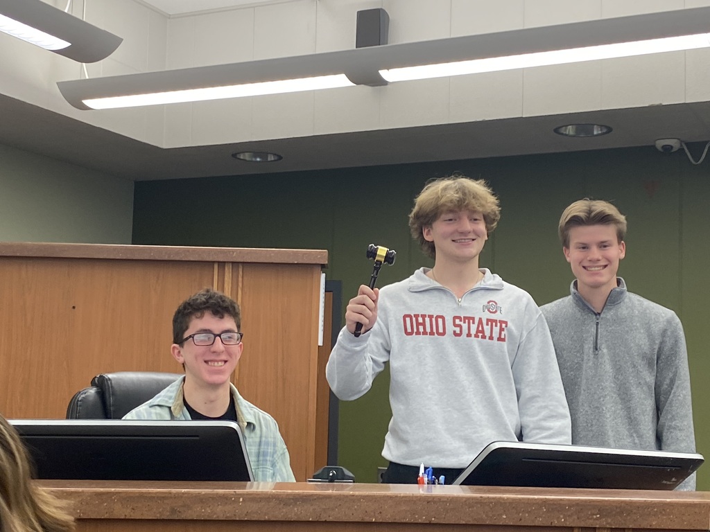 Judge speaking to students