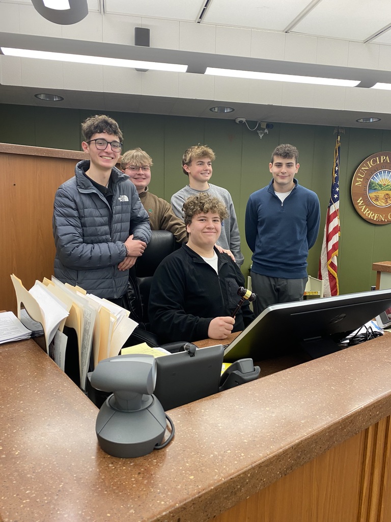 Judge speaking to students