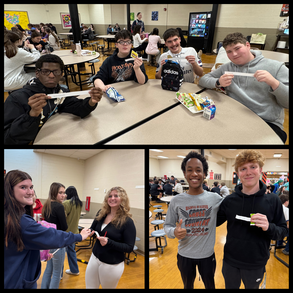 Students handing out notes and treats to staff members.