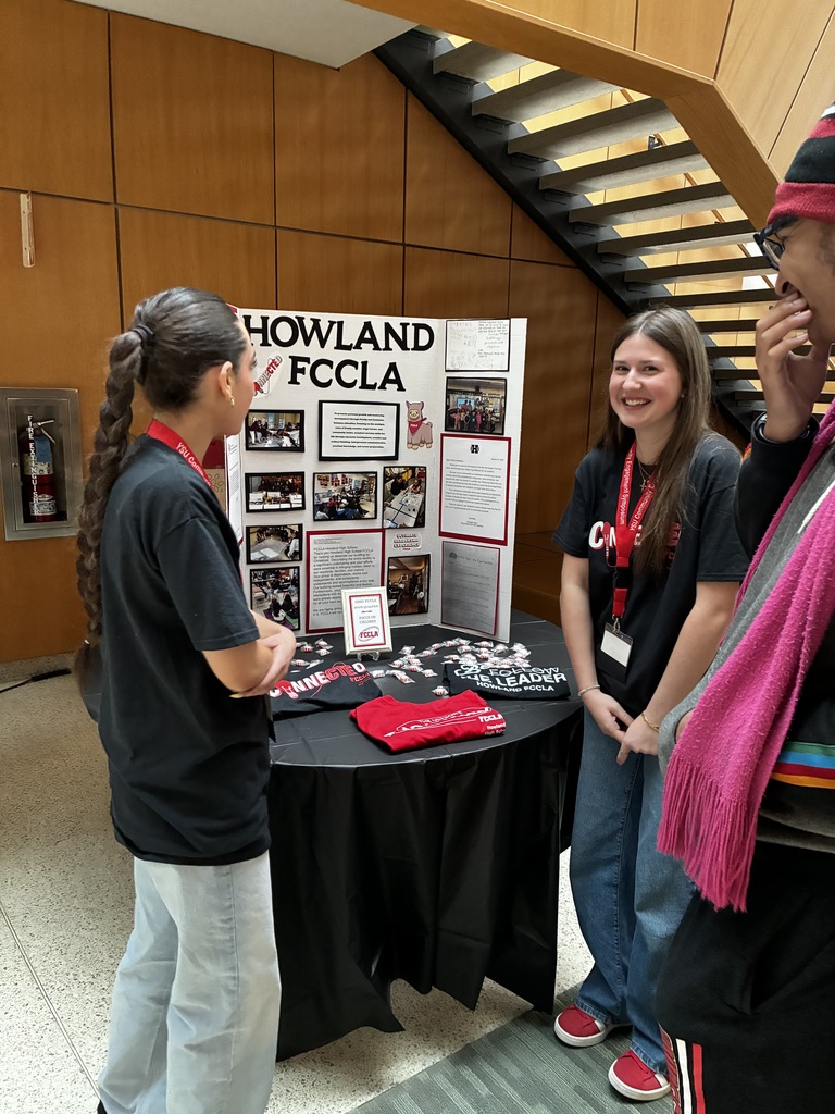  Two students presenting about FCCLA at the YSU Community Engagement Symposium