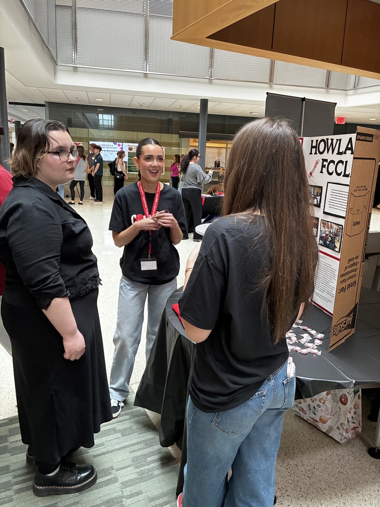  Two students presenting about FCCLA at the YSU Community Engagement Symposium