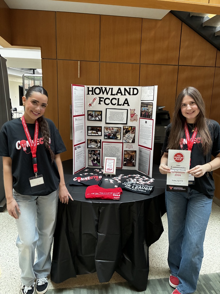  Two students presenting about FCCLA at the YSU Community Engagement Symposium
