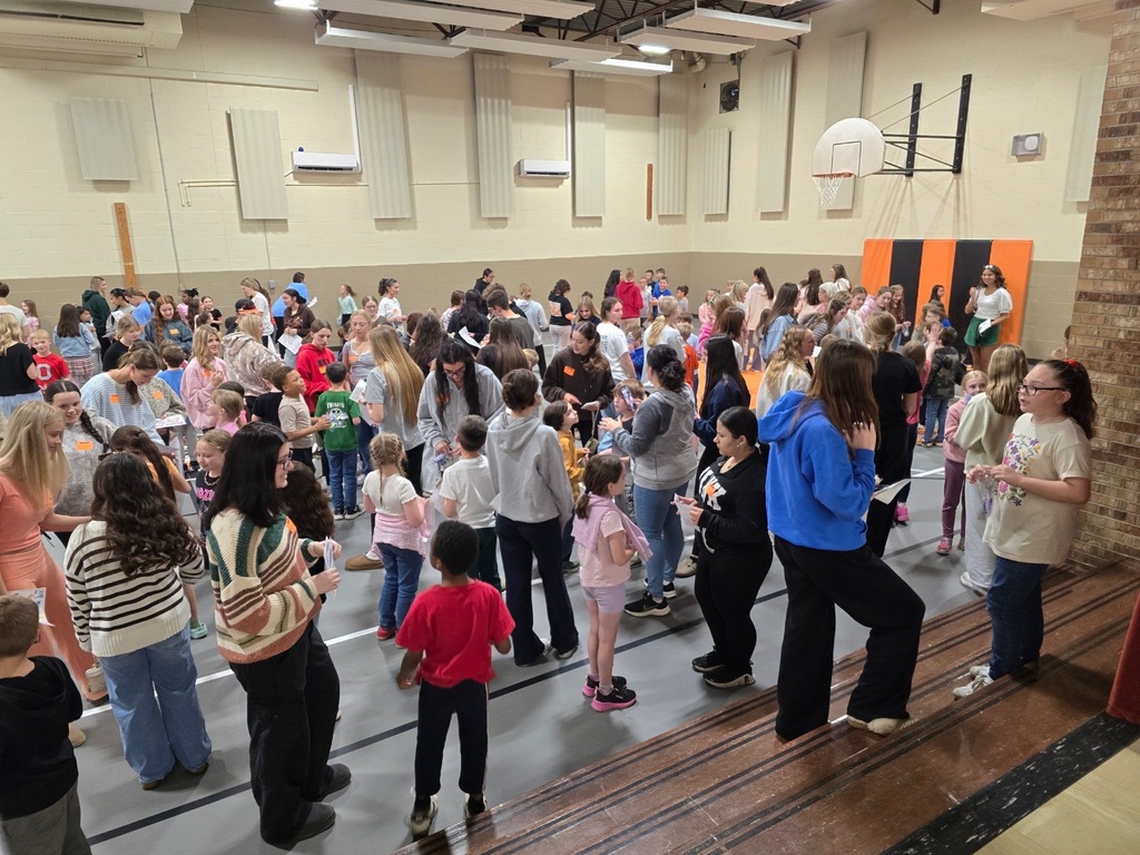 High school FCCLA students and elementary students from Howland Glen meet together after participating in a yearlong pen pal project.