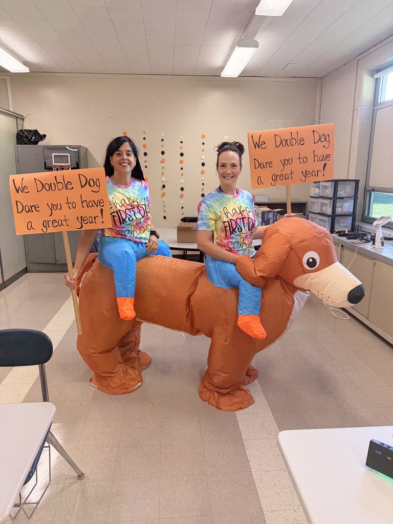 two teachers in a dog costume for the first day of school