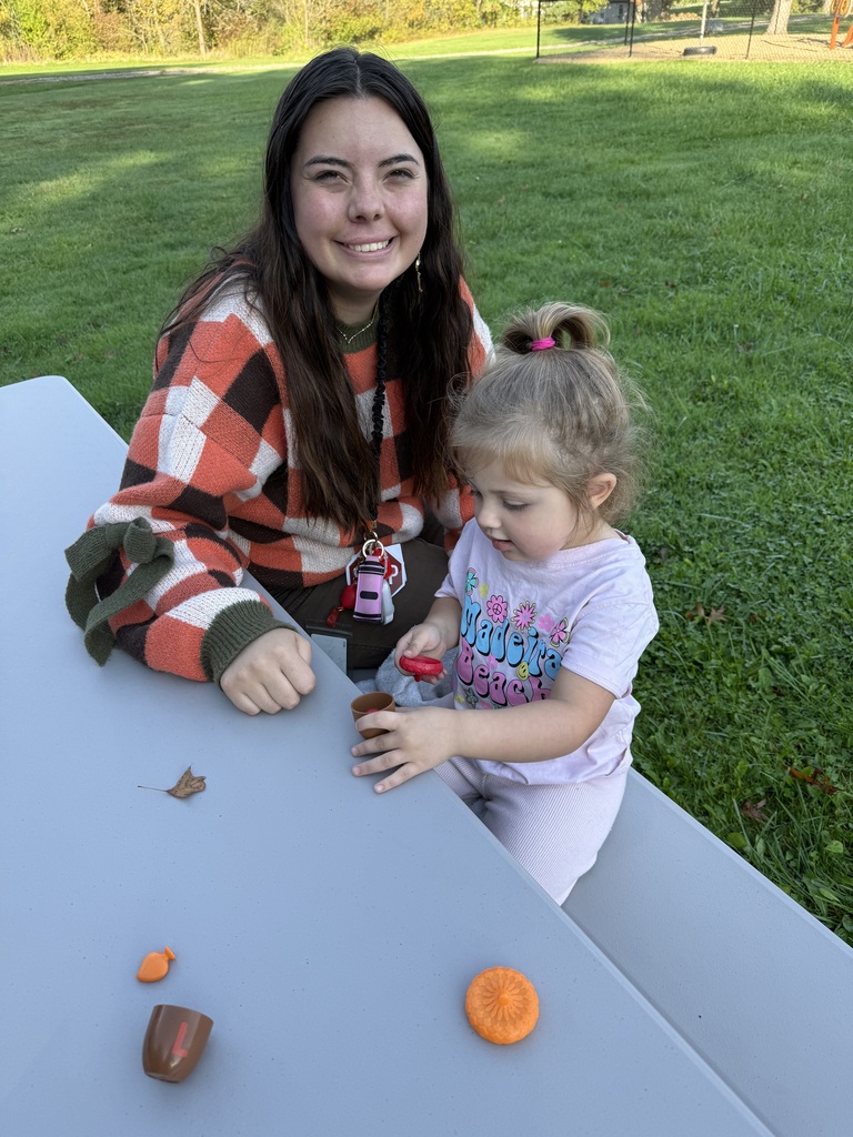 Howland Springs preschool children participate in outdoor storybook activities inspired by The Acorn and the Oak, exploring letters, acorns and tree growth.