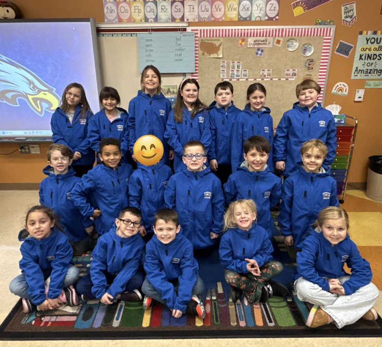Second graders receive Eagles coats