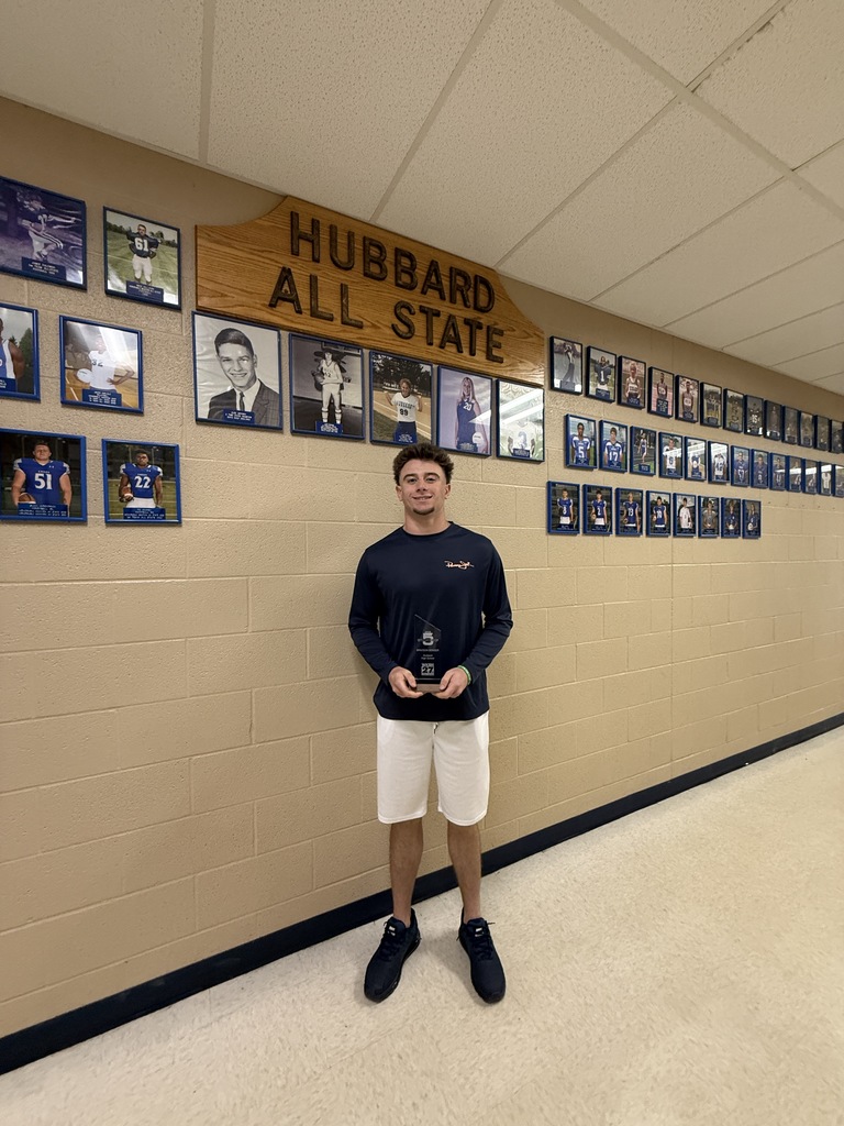 Braydon Songer poses while holding his WKBN 2026 Starting 5 award plaque.