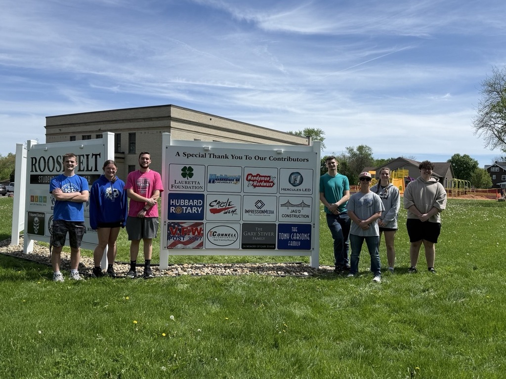 Hubbard High School seniors volunteer outdoors cleaning parks and helping community organizations during Senior Service Day.