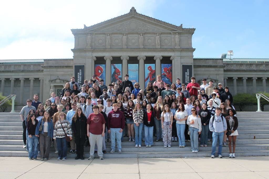 Hubbard High School students pose in Chicago near famous landmarks during an educational band and art trip.