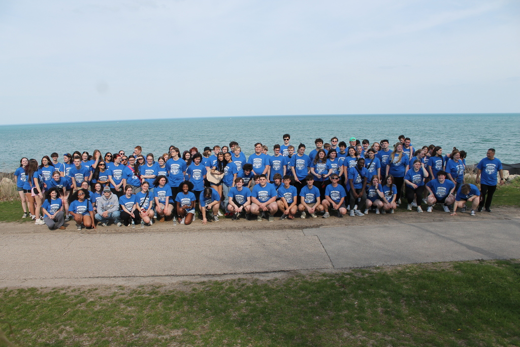 Hubbard High School students pose in Chicago near famous landmarks during an educational band and art trip.