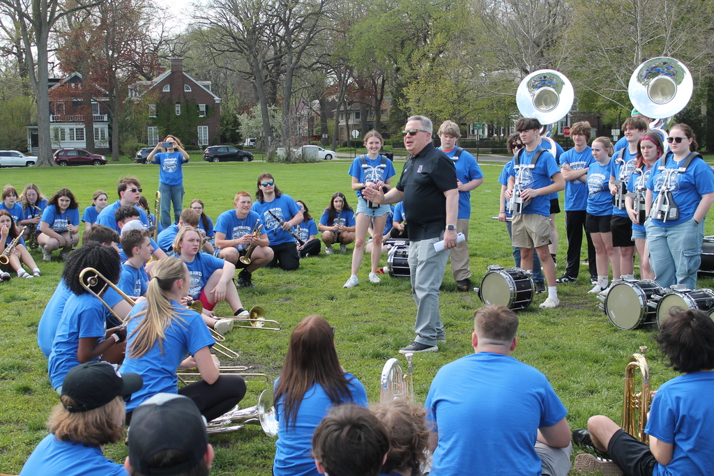 Hubbard High School students pose in Chicago near famous landmarks during an educational band and art trip.