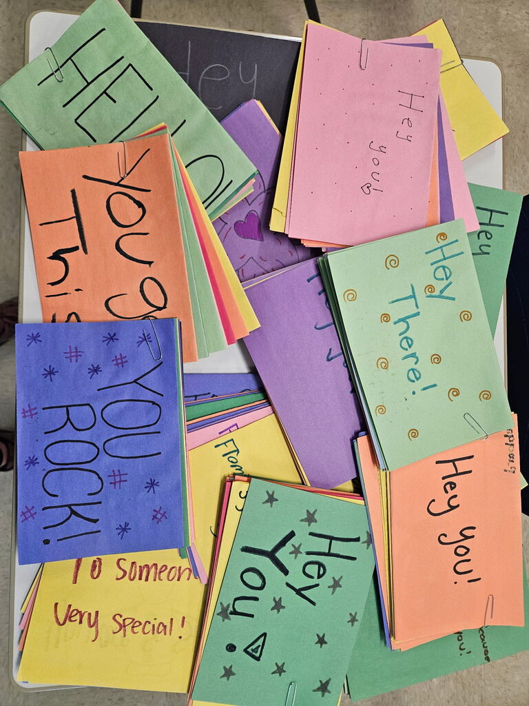 Hubbard High School students create colorful handmade cards with encouraging messages for hospitalized children.