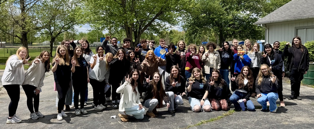 Hubbard High School ASL Club students gather outdoors at Harding Park enjoying food, games, and activities during an end-of-year picnic.
