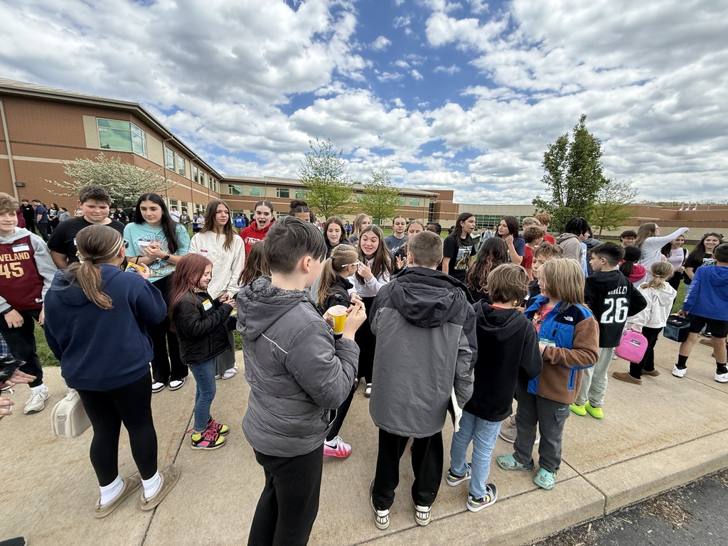 Hubbard middle school and elementary students meet and talk together after participating in a semester-long pen pal program.