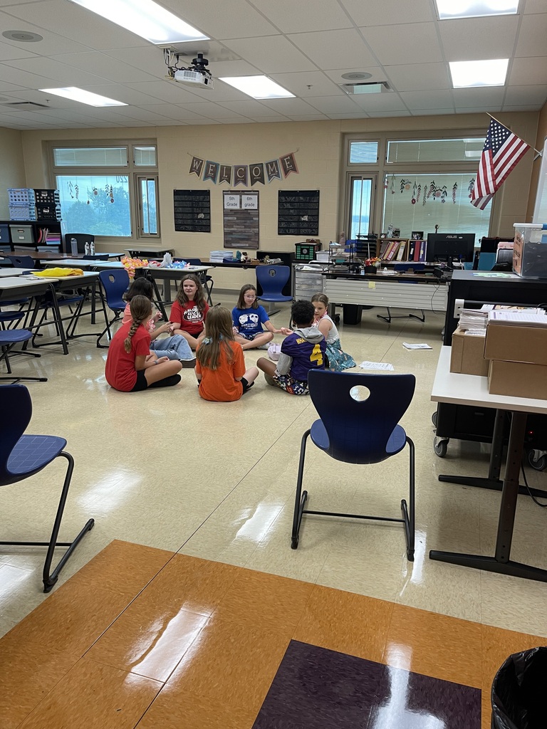 8th grade WEB Leaders welcome and assist 5th grade students during orientation at Hubbard Middle School, helping them learn about their new school and connect with classmates.