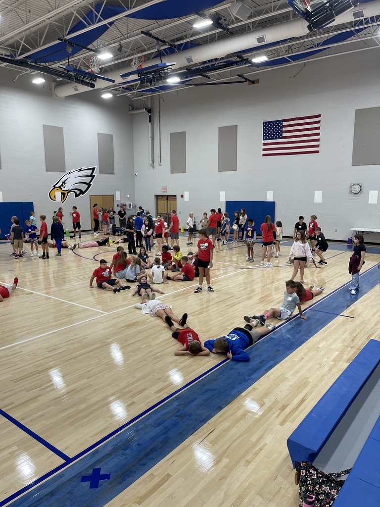 8th grade WEB Leaders welcome and assist 5th grade students during orientation at Hubbard Middle School, helping them learn about their new school and connect with classmates.