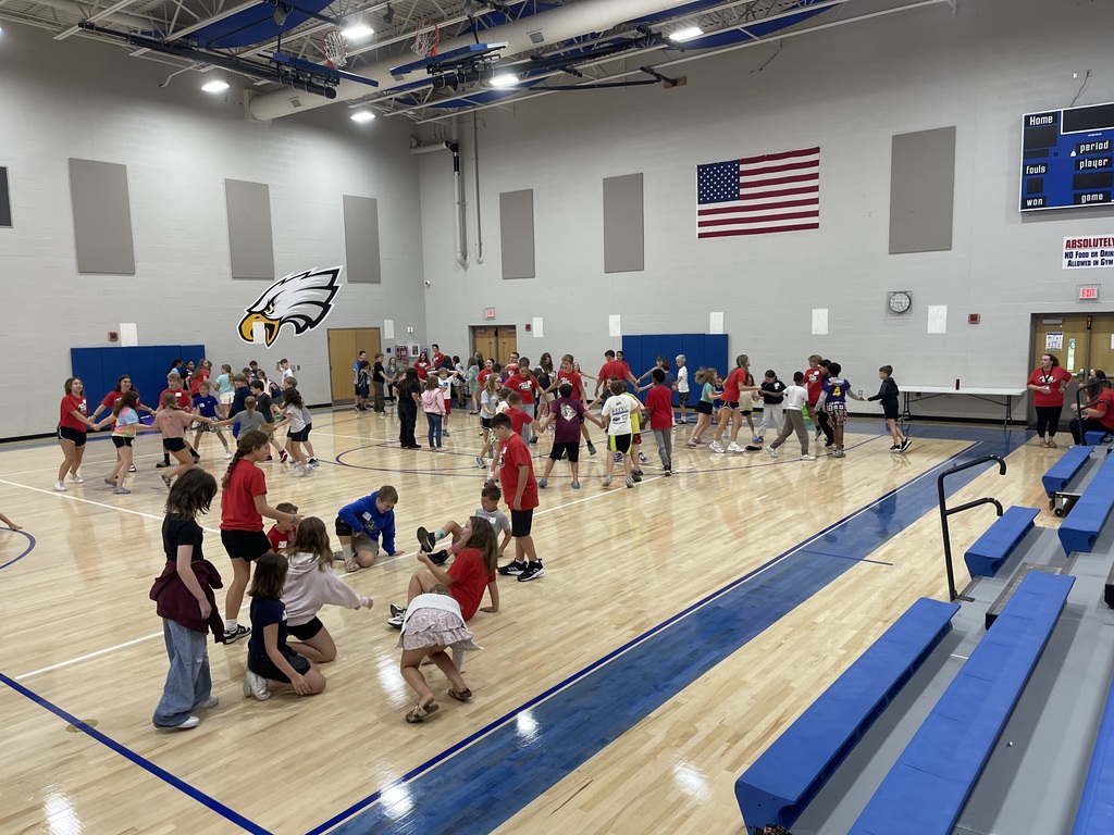 8th grade WEB Leaders welcome and assist 5th grade students during orientation at Hubbard Middle School, helping them learn about their new school and connect with classmates.