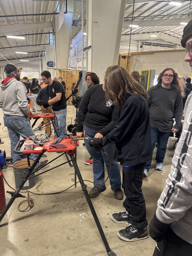 Hubbard students explore interactive exhibits at the Mahoning Valley Skilled Trades Expo at the Canfield Fairgrounds.