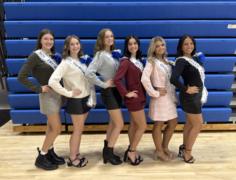 homecoming court attendees pose