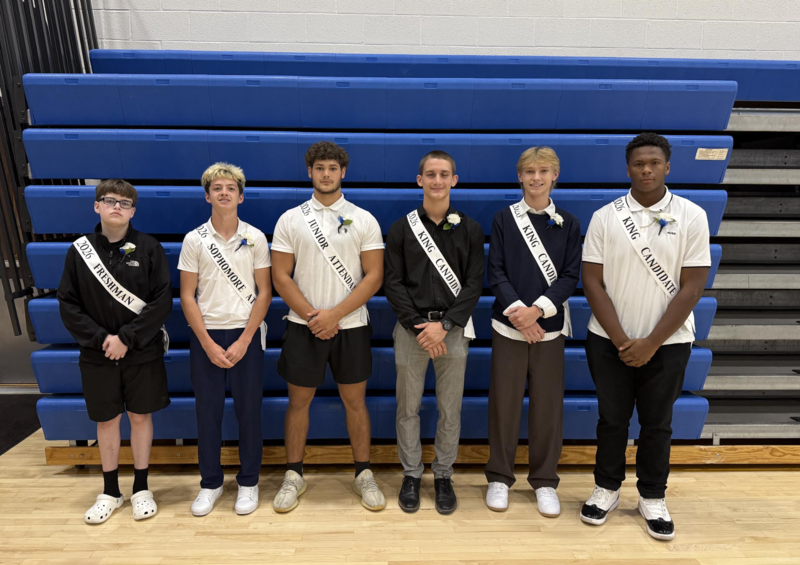 homecoming court attendees pose