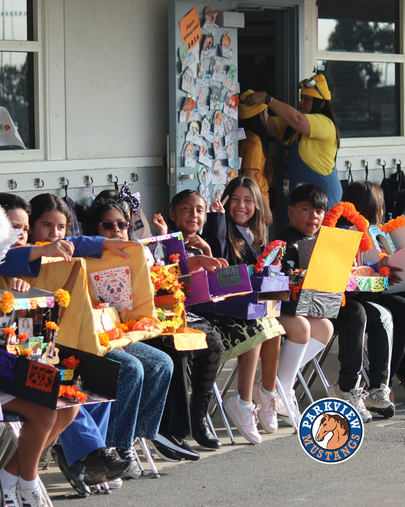 kids dressed in costumes celebrating Halloween