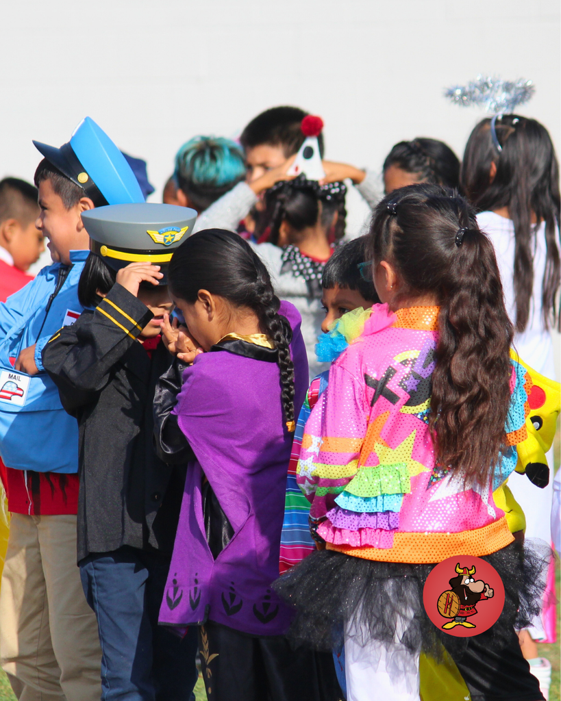 kids dressed in costumes celebrating Halloween