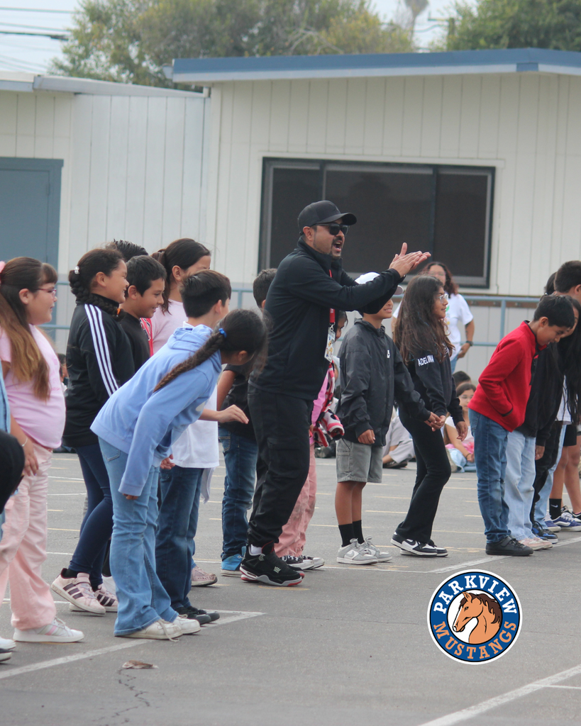 kids dancing with Mr. Rickey