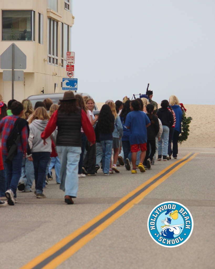 kids walking for veterans day celebration