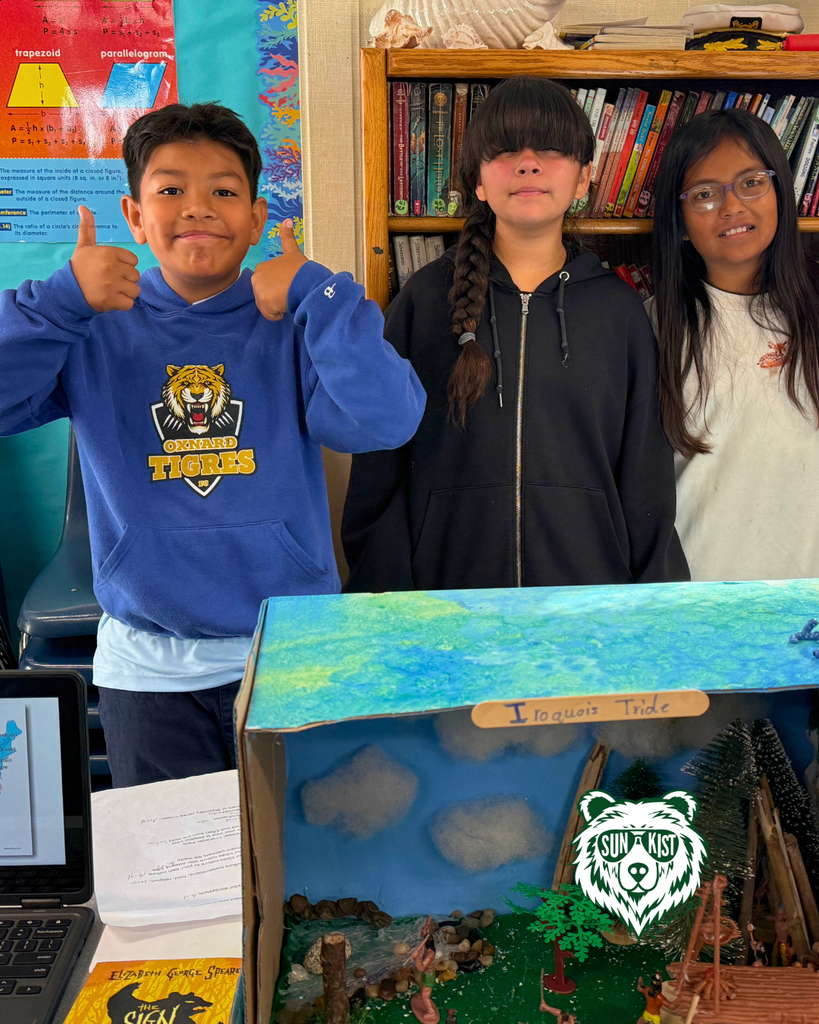 kids posing for picture during presentations