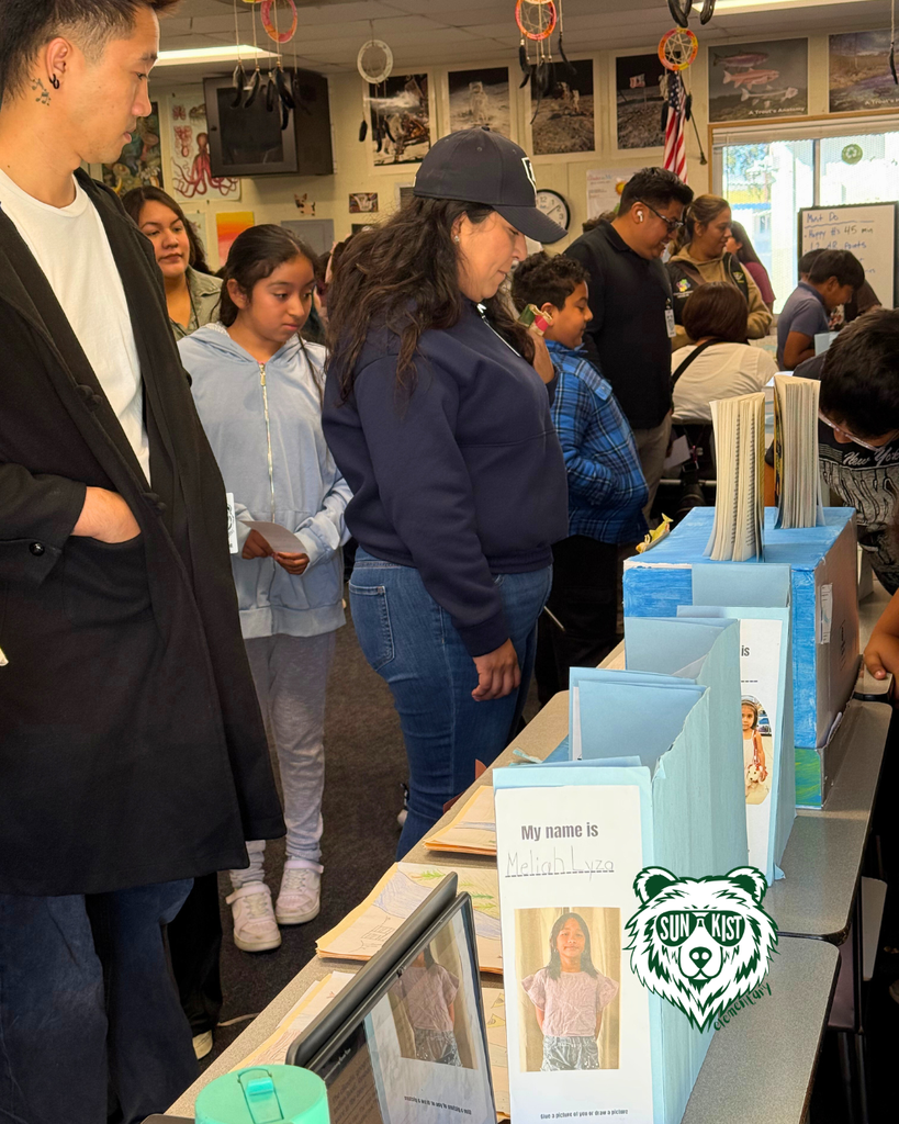 attendees viewing student projects