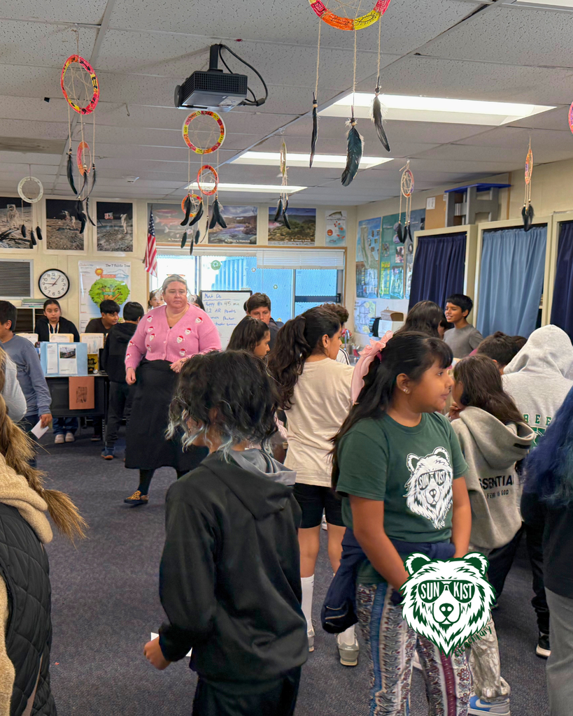 people walking around viewing projects