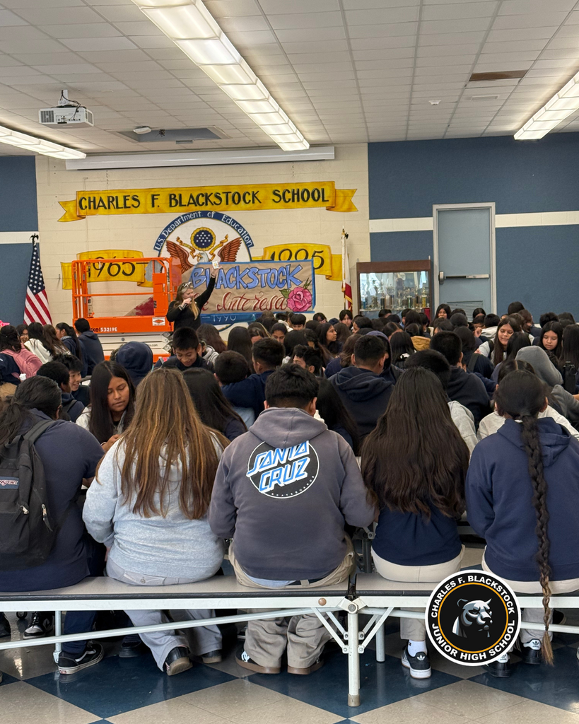 group picture of backs of 6th grader playing bingo