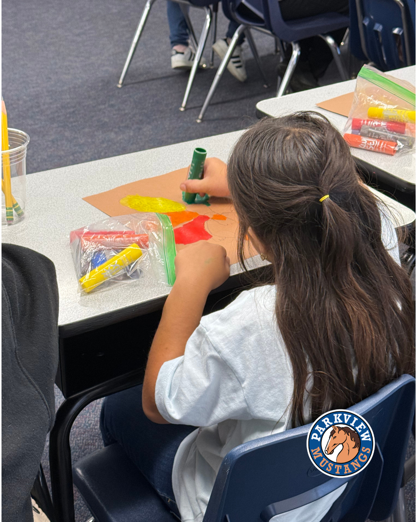 students creating art in class