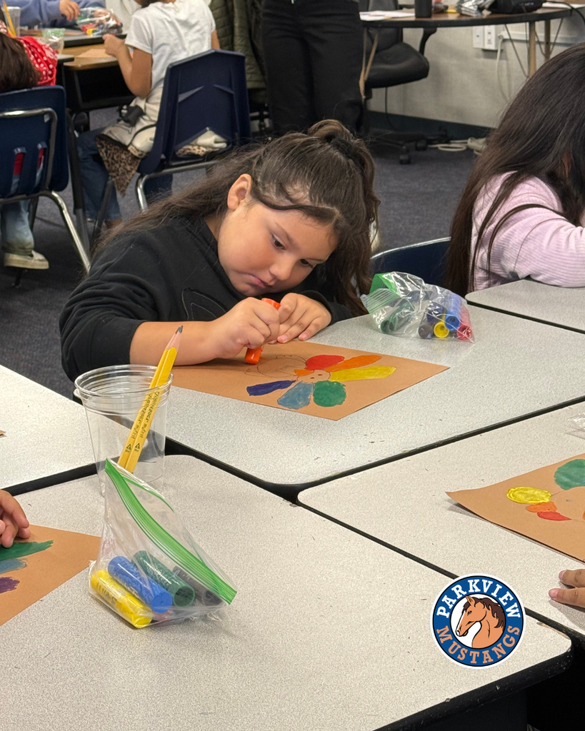 students creating art in class