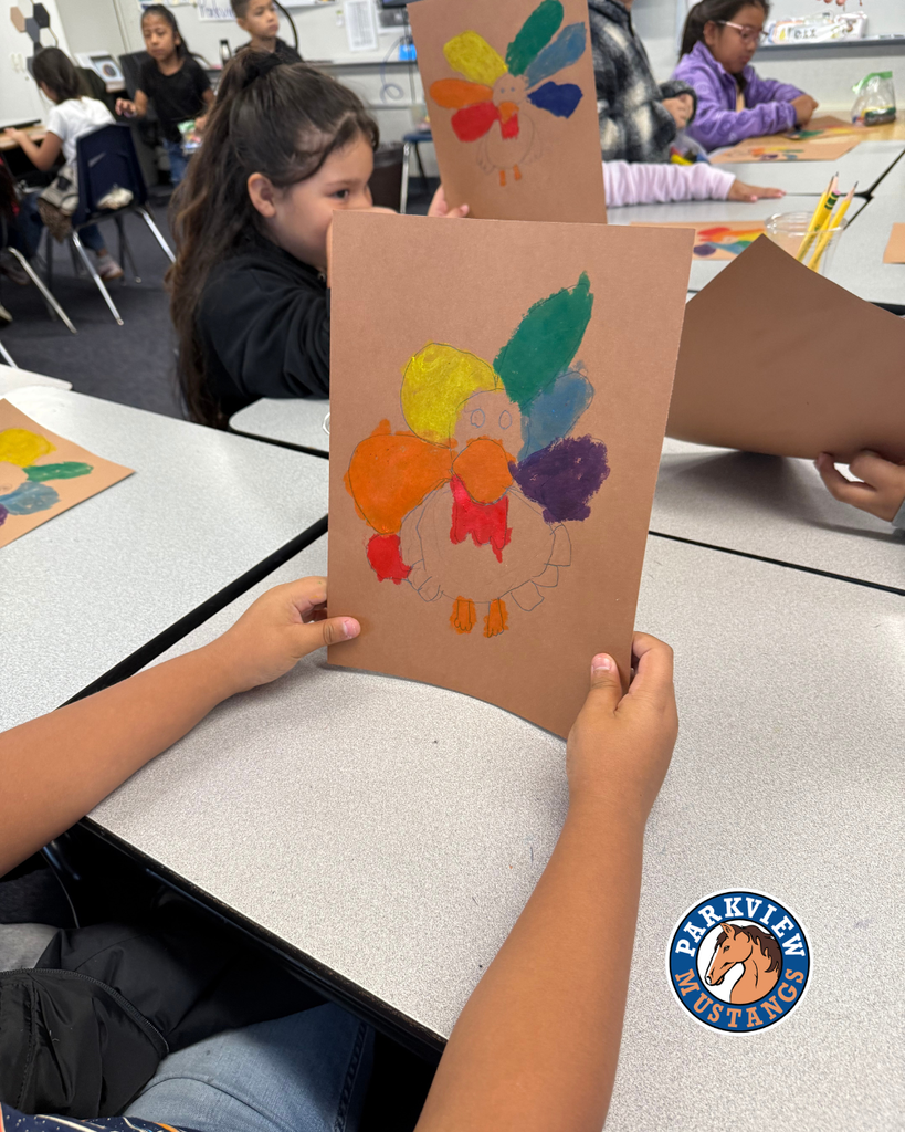 students creating art in class