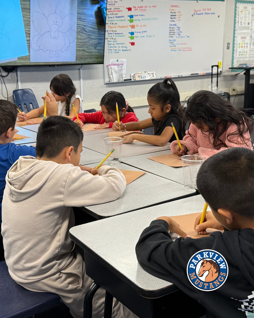 students creating art in class