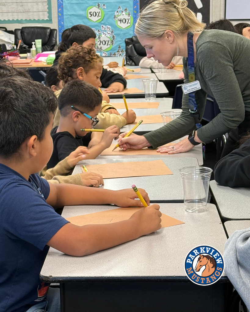 students creating art in class