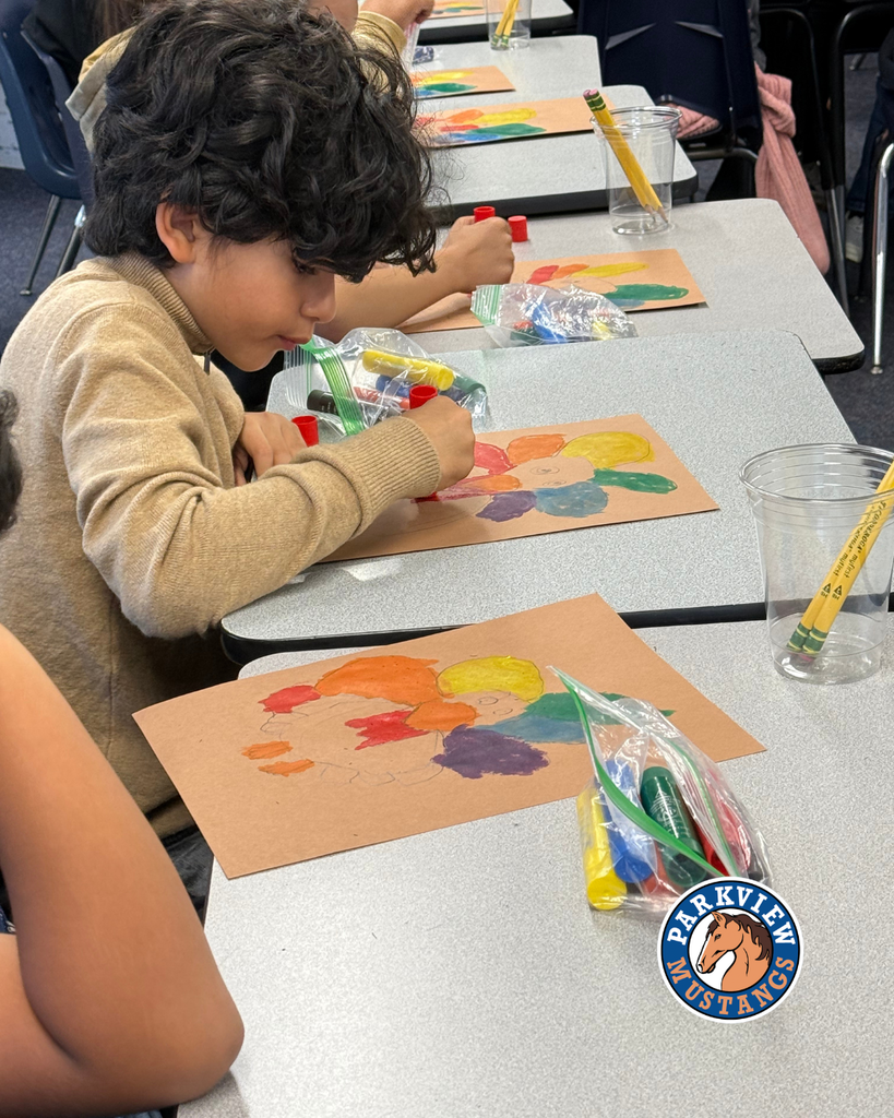 students creating art in class