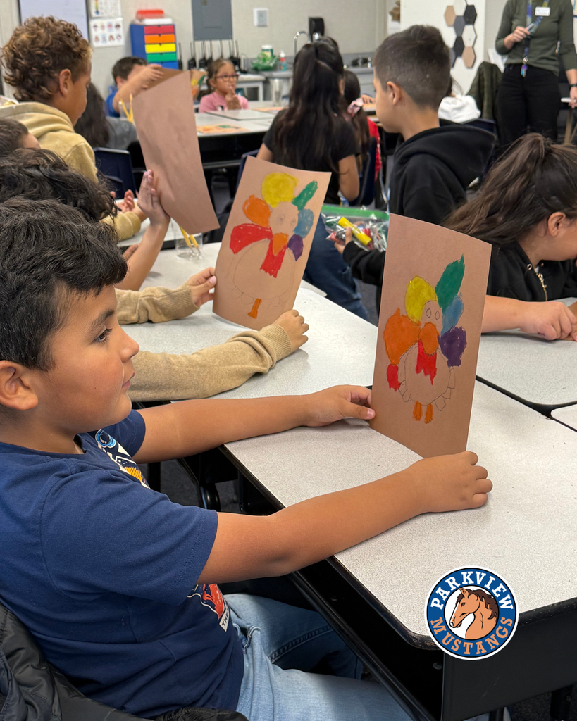 students creating art in class