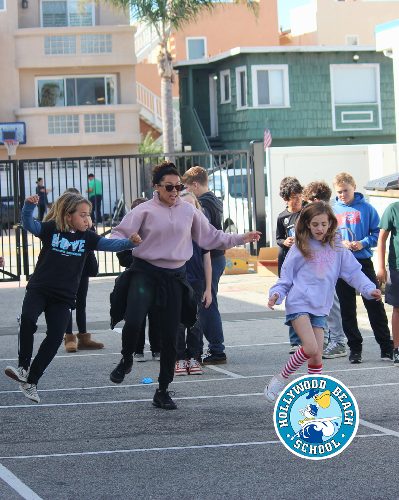 Ms.Jenna teaching line dancing to Ms. Thompson's 5th grade class. 