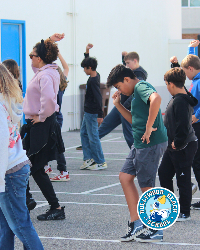 Ms.Jenna teaching line dancing to Ms. Thompson's 5th grade class.  