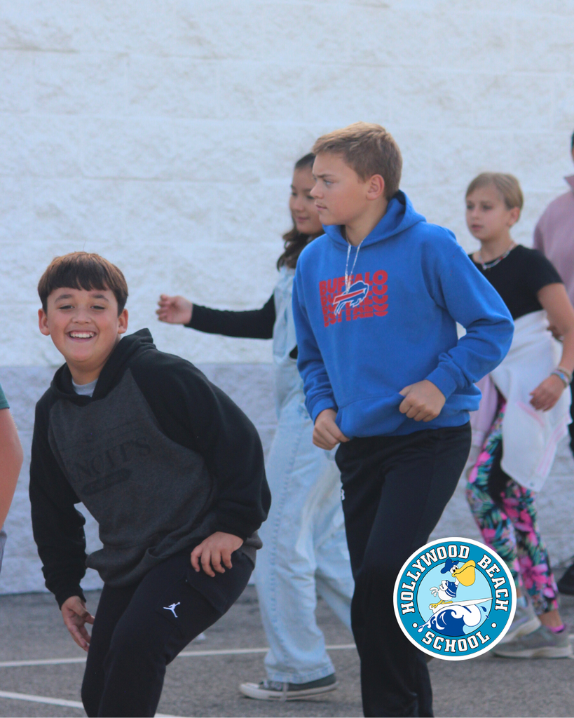 Ms.Jenna teaching line dancing to Ms. Thompson's 5th grade class.  