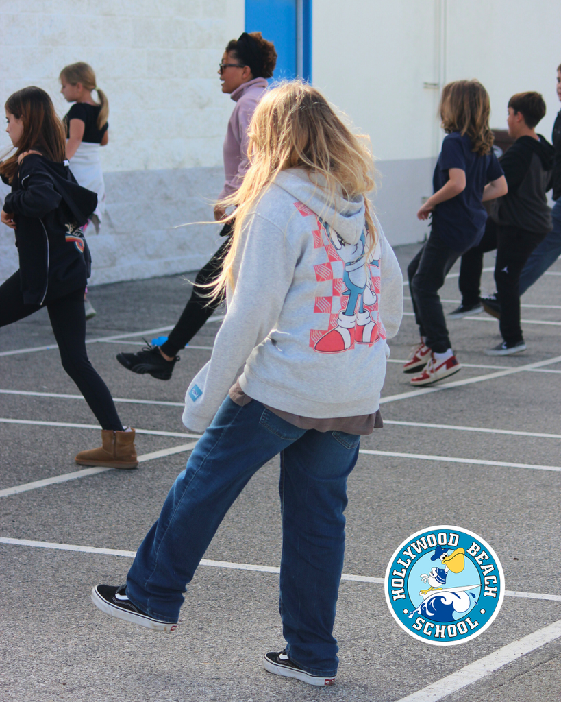Ms.Jenna teaching line dancing to Ms. Thompson's 5th grade class.  